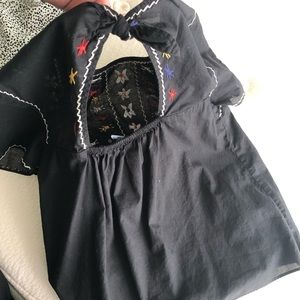 Fun, embroidered shirt.